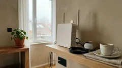 Moeda em cima do router melhora o Wi‑Fi? O que é mito — e o que funciona mesmo em casa